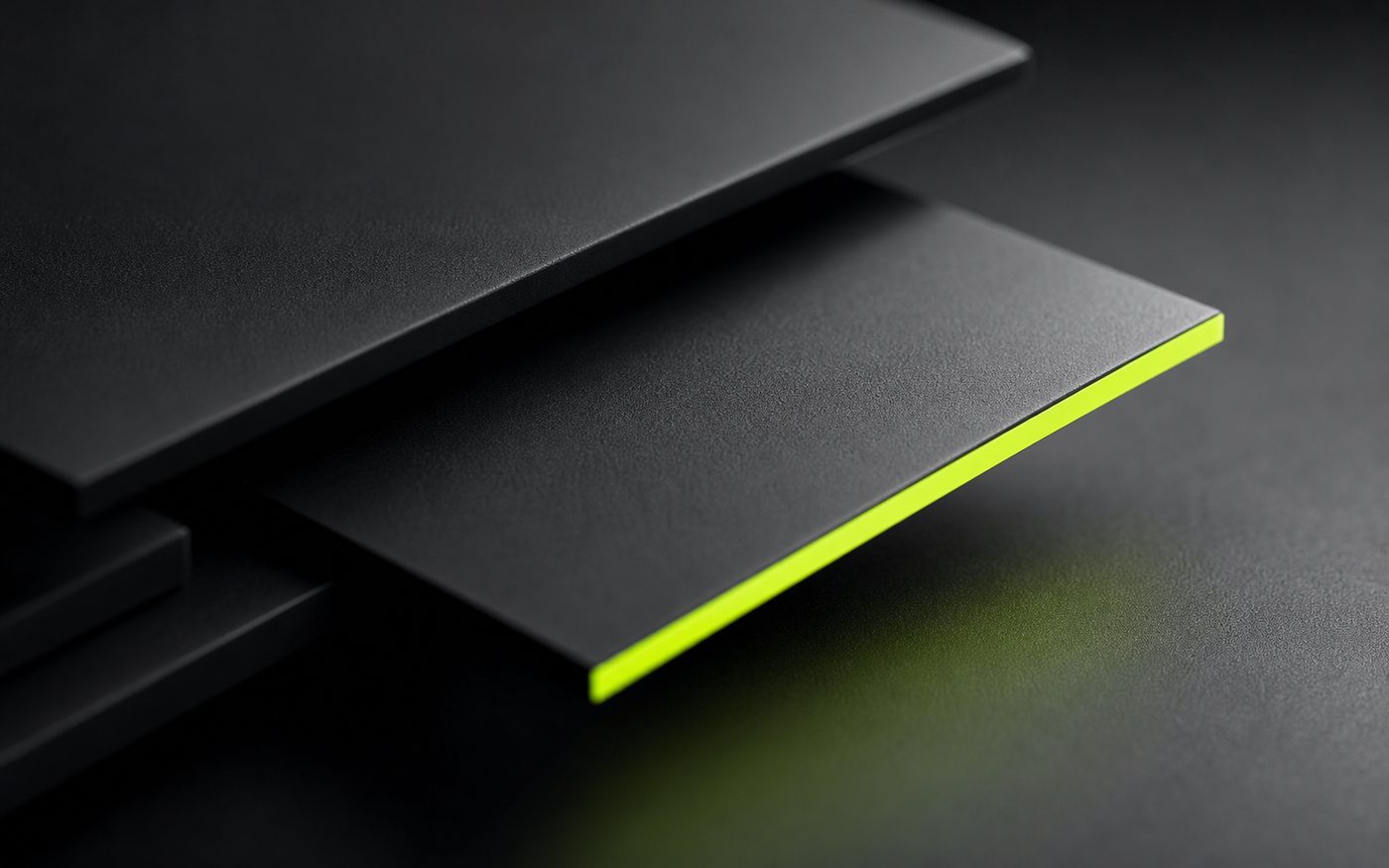 Brand artwork: stacked dark sheets with a lime edge. Not a screenshot of the application.